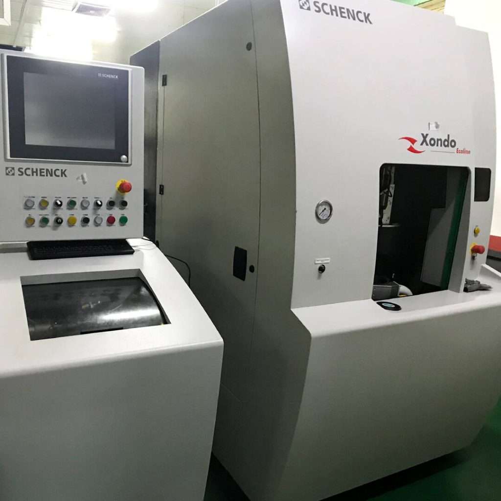 High volume compressor wheel and turbine shaft and wheel component balance using Schenck Automatic balance machine